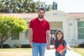 Father and son run with father after come back from school. Child education.