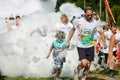 Father And Son Run Through Foamy Bubbles At Bubble Palooza