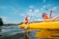 Father and son are sailing in the canoe in tropical lagoon Royalty Free Stock Photo