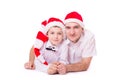 Father and son in Santa's hats