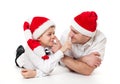 Father and son in Santa's hats