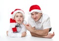 Father and son in Santa's hats