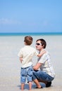 Father and son at shallow water Royalty Free Stock Photo