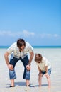 Father and son at shallow water Royalty Free Stock Photo