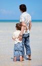 Father and son at shallow water Royalty Free Stock Photo