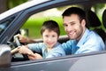 Father and son sitting in a car Royalty Free Stock Photo