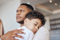 Father, son and sleeping on couch with worry, fatigue and comfort care in mental health in home. Little boy, man and