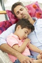 Father And Son Sleeping In Garden Hammock Together Royalty Free Stock Photo