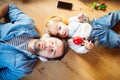 Father and son with smartphone and earphones, listening music. Royalty Free Stock Photo