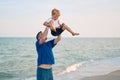 Father son spending time together sea vacation Young dad child little boy walking beach Royalty Free Stock Photo