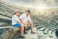 Father and son spent time together on antique ruins amphitheater