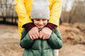 Father and son stand on the shore of the lake and hold hands. Happy family with child kid boy playing and having fun Royalty Free Stock Photo