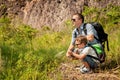 Father and son standing near the pond at the day time. Royalty Free Stock Photo