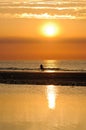 Father and son at sunset