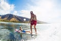 Father and Son Surfing, Riding Wave Together Royalty Free Stock Photo