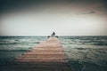Father and son together by the sea. Family walking on the pier Royalty Free Stock Photo