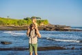 Father and son tourists on the background of Tanah Lot - Temple Royalty Free Stock Photo