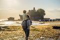 Father and son tourists on the background of Tanah Lot - Temple Royalty Free Stock Photo