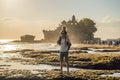 Father and son tourists on the background of Tanah Lot - Temple Royalty Free Stock Photo