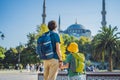 father and son tourists enjoying the view Blue Mosque, Sultanahmet Camii, Istanbul, Turkey. Traveling with kids concept Royalty Free Stock Photo