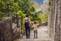 Father and son tourists in Herceg Novi old town. Historical and touristic center of Herceg Novi. Montenegro Royalty Free Stock Photo