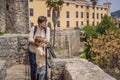 Father and son tourists in Herceg Novi old town. Historical and touristic center of Herceg Novi. Montenegro Royalty Free Stock Photo