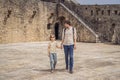 Father and son tourists in Herceg Novi old town. Historical and touristic center of Herceg Novi. Montenegro Royalty Free Stock Photo