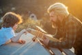 Father and son with toy airplane dreams of traveling. Father playing with kid. Dream of flying. Father and his daughter Royalty Free Stock Photo
