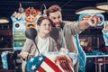 Father and son on toy motorcycle. Family rest