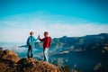 Father and son travel in nature, family hiking in mountains Royalty Free Stock Photo