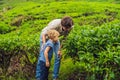 Father and son are traveling on a tea plantation in Malaysia. Tr Royalty Free Stock Photo