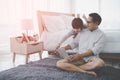 Father and son is using Computer Laptop for Education together at home is the Bedroom Royalty Free Stock Photo