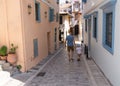 Father and son walk the narrow streets of Greek Nafplion. Family weekend and sightseeing Royalty Free Stock Photo