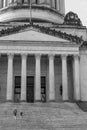 Black and white image of people walking up the steps of the Washington State Capitol building Royalty Free Stock Photo