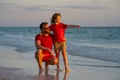 Father and son walking together on the beach. Fatherhood family concept. Travel on sea with father. Relax on beach