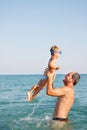 Father and son on water