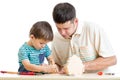 Father and son work together Royalty Free Stock Photo