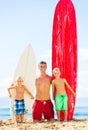 Father and Sons Going Surfing Royalty Free Stock Photo
