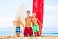 Father and Sons Going Surfing Royalty Free Stock Photo