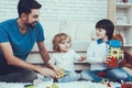 Father and Sons is Playing with Toys Royalty Free Stock Photo