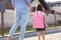 Father taking his little child to school Royalty Free Stock Photo