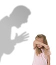 Father or teacher shadow screaming angry reproving young sweet little schoolgirl or daughter Royalty Free Stock Photo