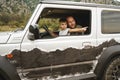 Father teaches little son to drive on road trip Royalty Free Stock Photo