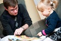 Father teaching daughter