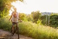 Father teaching his son how to ride a bicycle Royalty Free Stock Photo