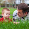 Father teaching his son about the nature Royalty Free Stock Photo