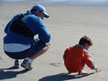 Father teaching his son to write Royalty Free Stock Photo