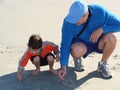 Father teaching his son to write Royalty Free Stock Photo