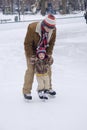 Father teaching son to skate Royalty Free Stock Photo