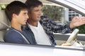 Father Teaching Teenage Son To Drive